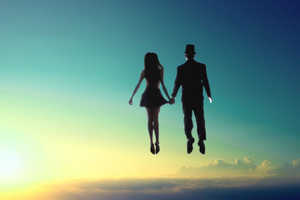 man and woman floating on sky 1988683